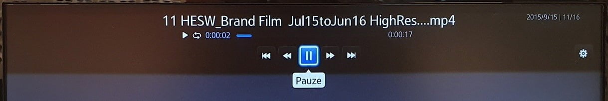 video player controls and icons visible on screen